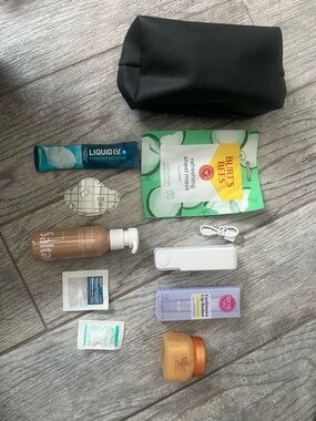 (5) Black Travel Cosmetic Pouch with Assorted Skincare & Beauty Items
